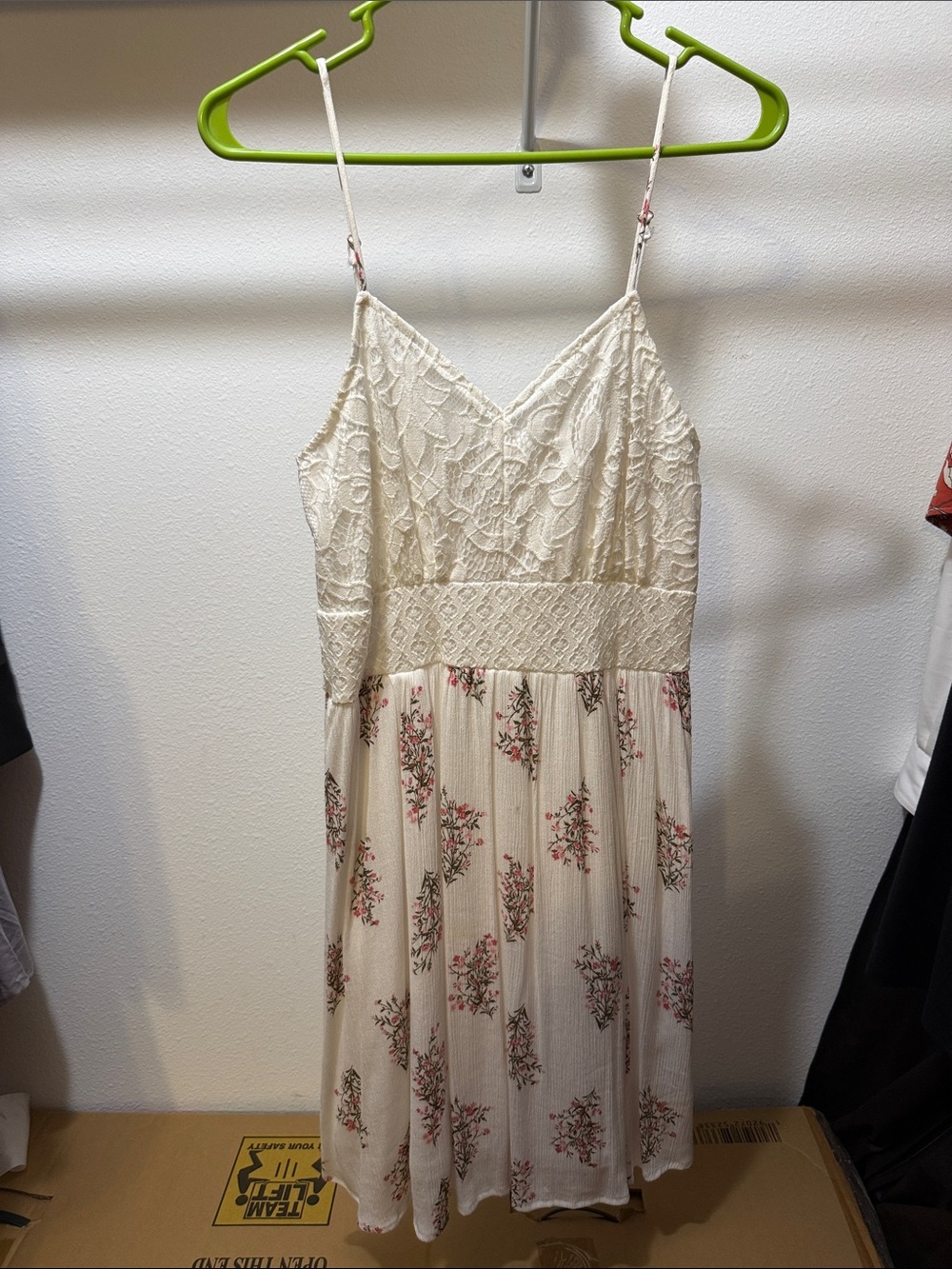 White dress with floral patterns